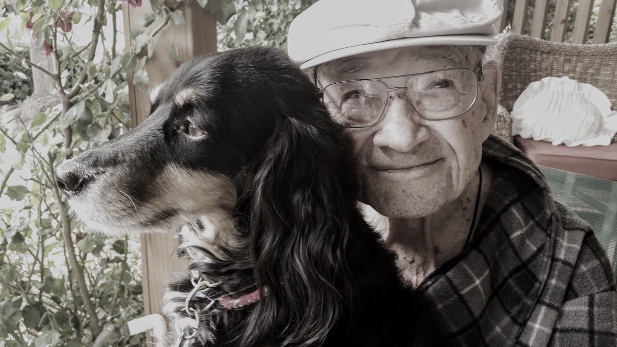 A senior with their pet — peace of mind, every morning.
